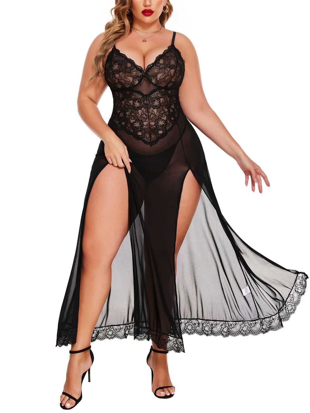 Black lace lingerie set with sheer overlay on a white background